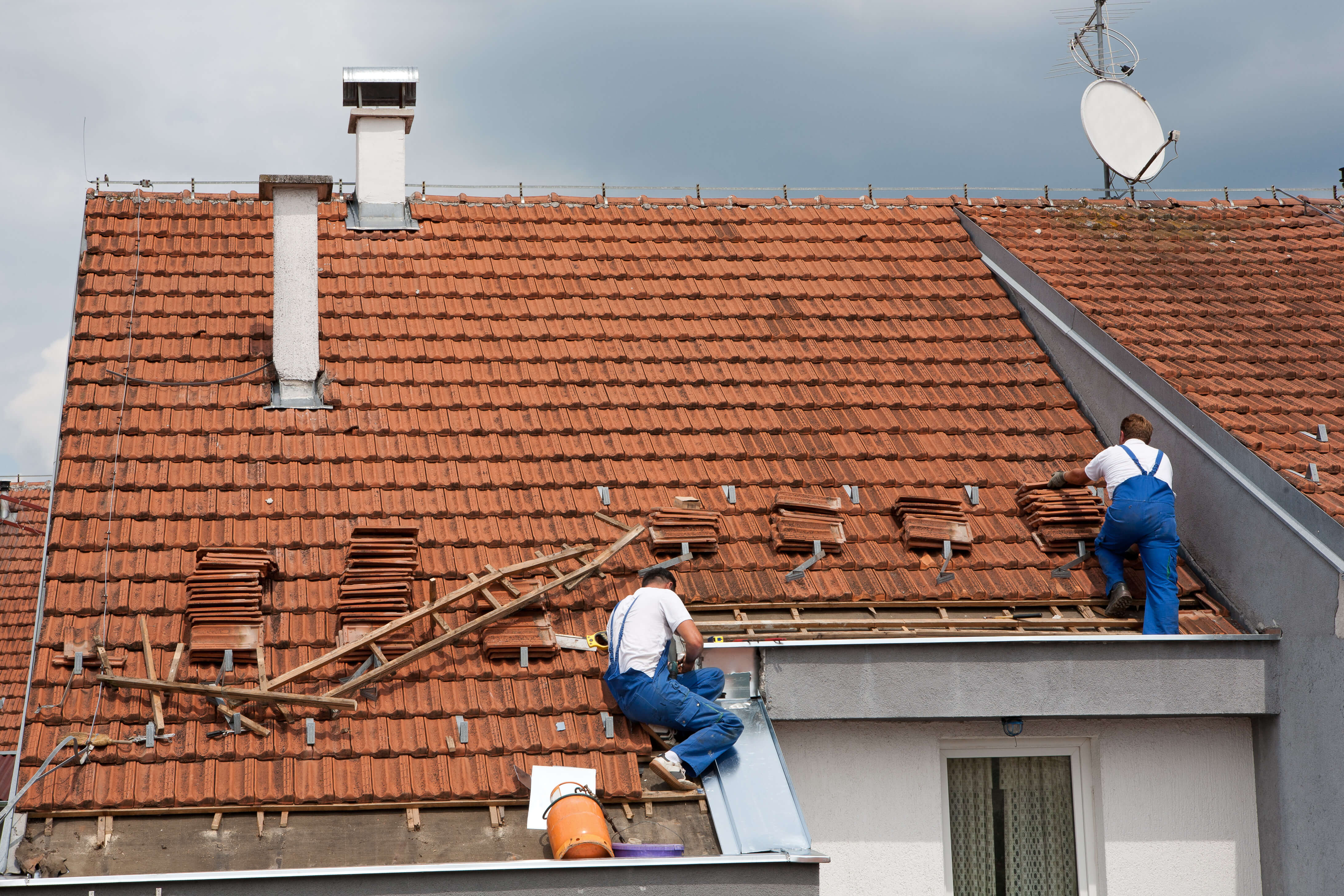 Roofers on a roof